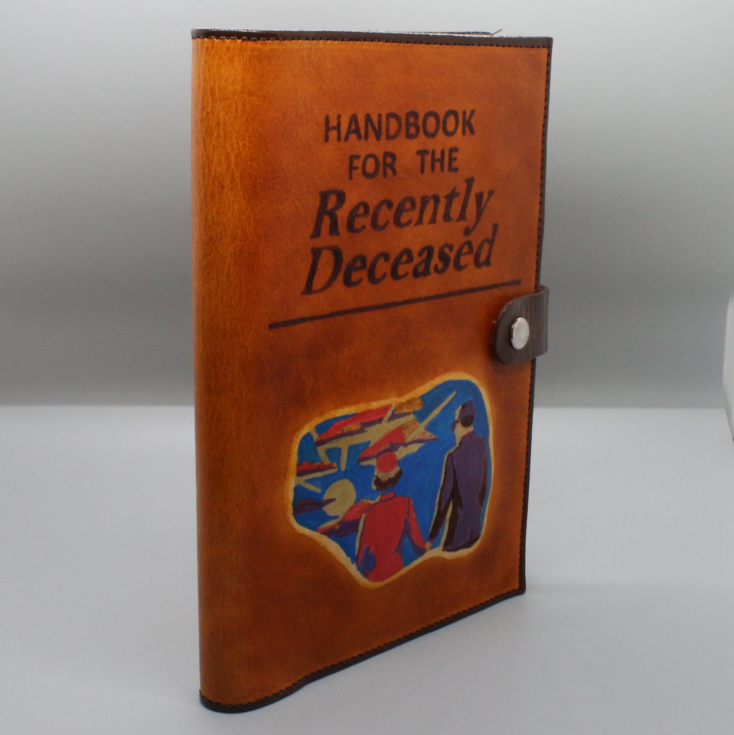 Handbook for the Recently Deceased Handburned Leather Book Cover